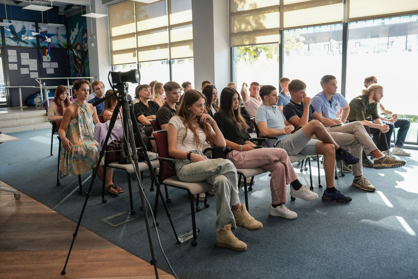 Young people listening during a workshop session